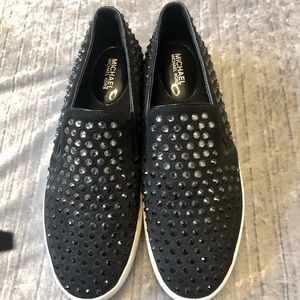 Michael Kors slip on sneakers.